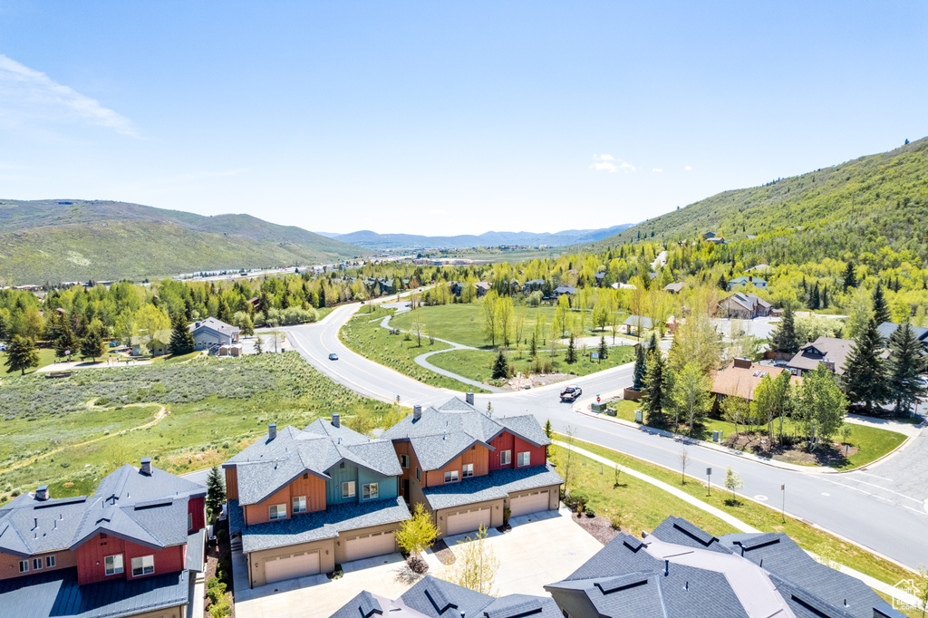 Aerial view of residential area with mountains