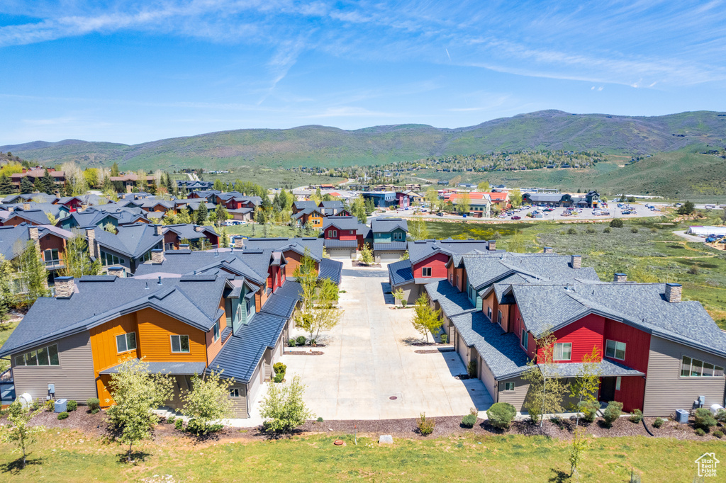 Aerial view of residential area with a mountain backdrop