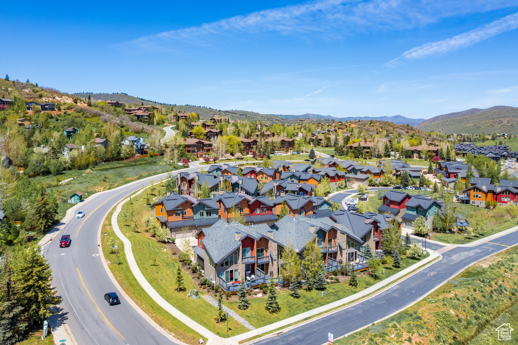 Aerial view of residential area with a mountainous background
