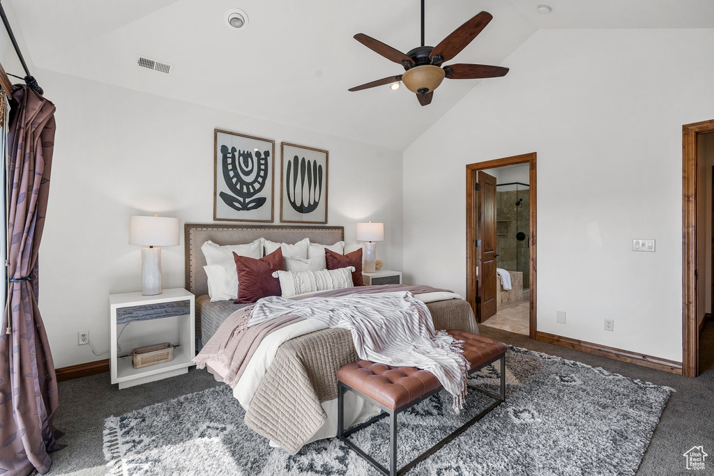 Bedroom with carpet flooring, high vaulted ceiling, connected bathroom, and a ceiling fan
