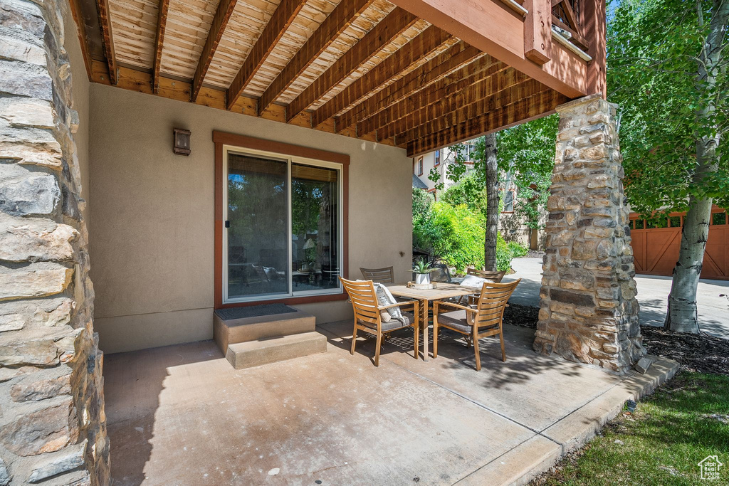 View of patio with outdoor dining space
