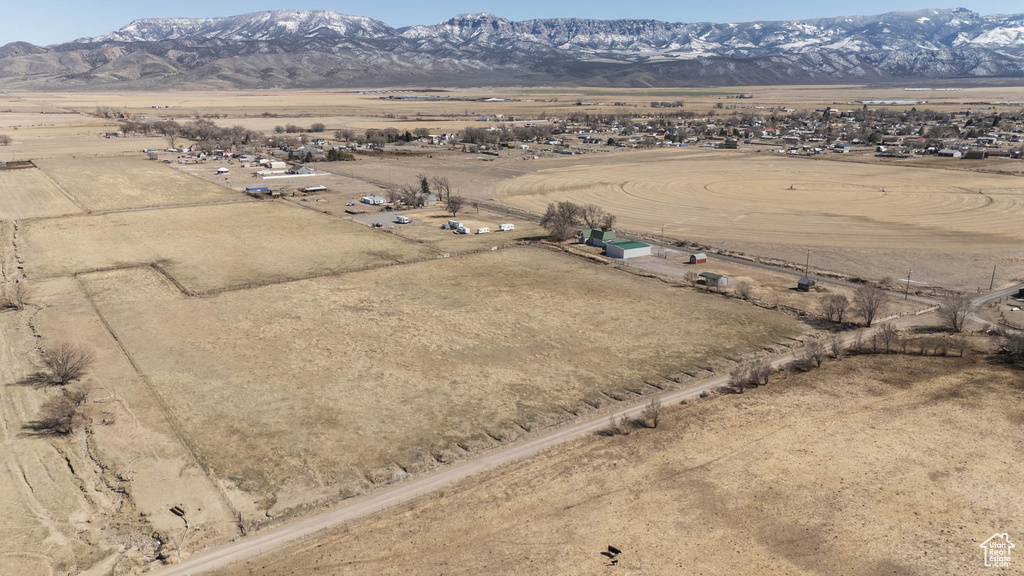 Drone / aerial view featuring a mountain view and a rural view