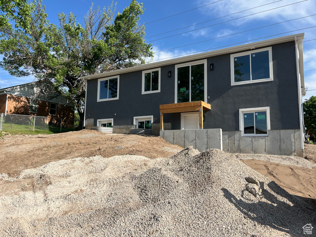 View of front facade with stucco siding