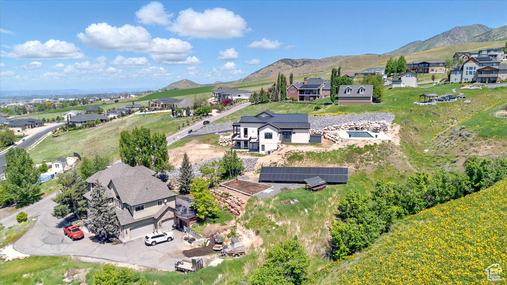 Aerial view of residential area with a mountain backdrop