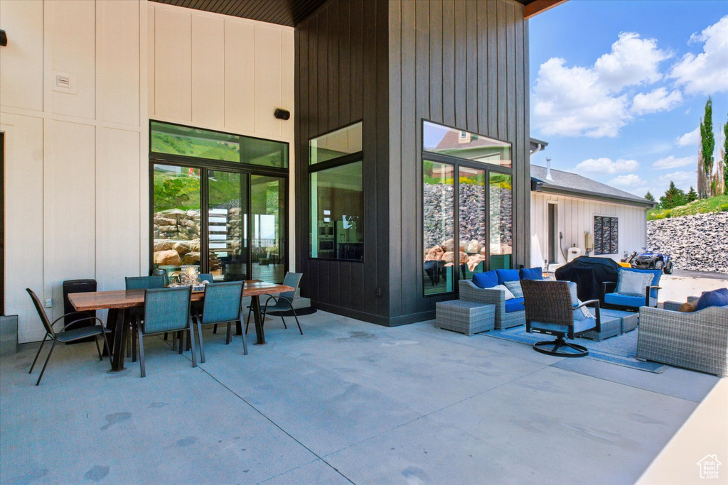 View of patio / terrace with an outdoor living space and outdoor dining space