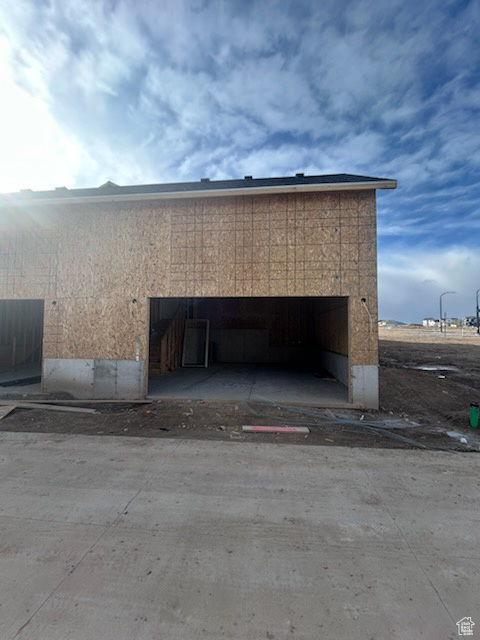 Exterior details featuring concrete driveway