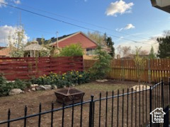 View of yard featuring a fenced backyard
