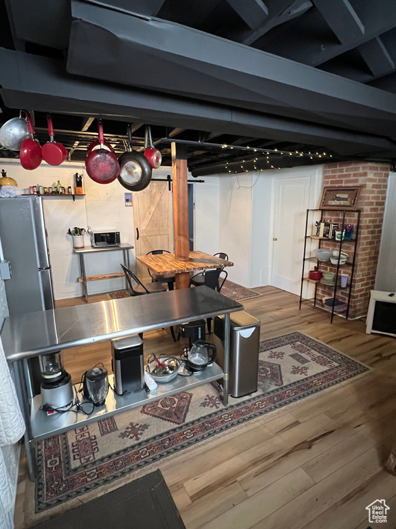 Finished basement with wood finished floors