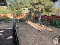 View of yard with fence