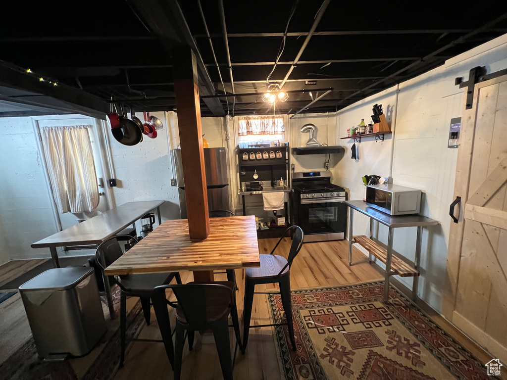 Dining area featuring light wood-style flooring