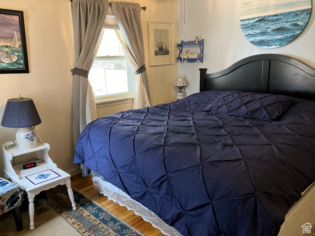 Bedroom featuring wood finished floors