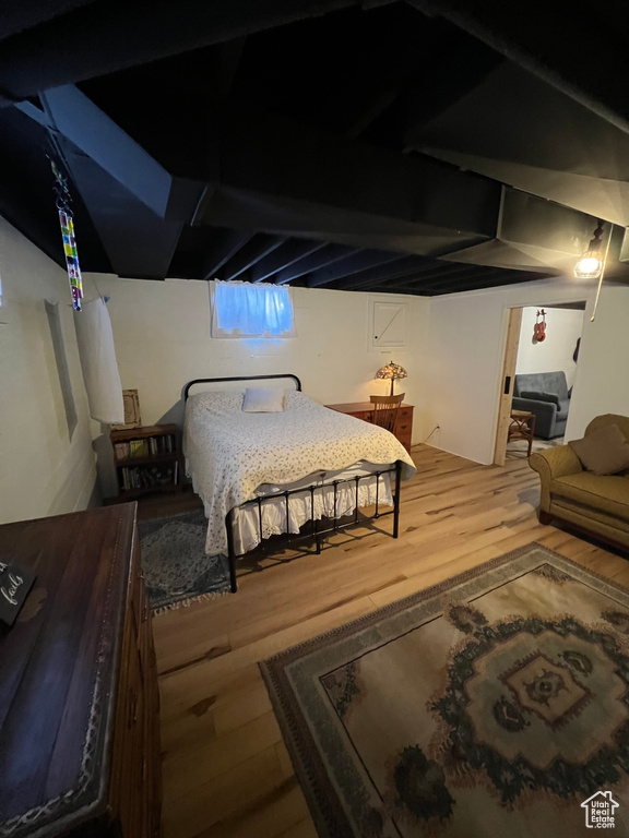 Bedroom featuring wood finished floors