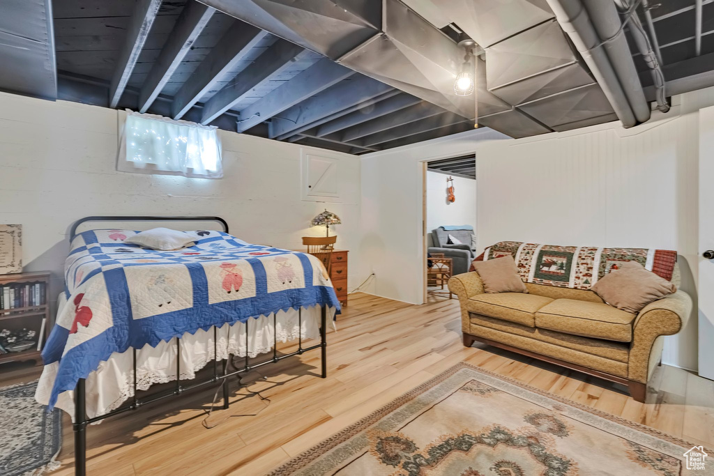 Bedroom with wood finished floors