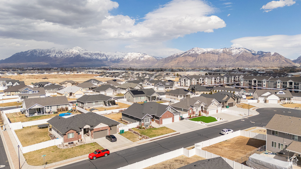 Birds eye view of property featuring a mountain view and a residential view