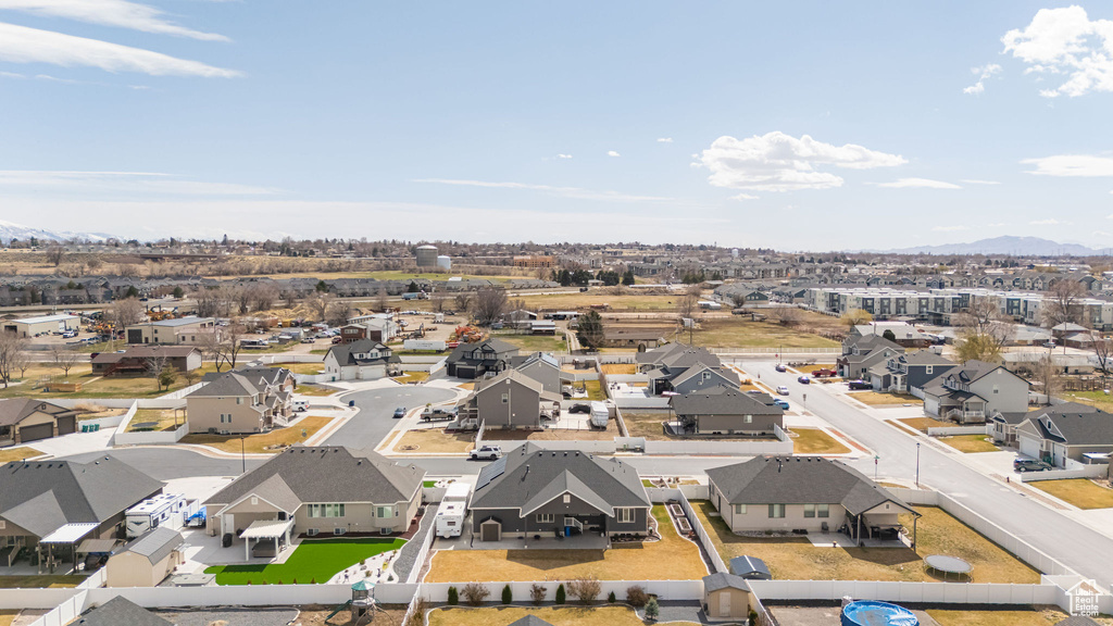 Birds eye view of property with a residential view