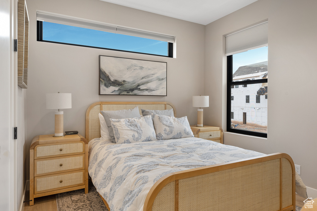 Bedroom with wood finished floors