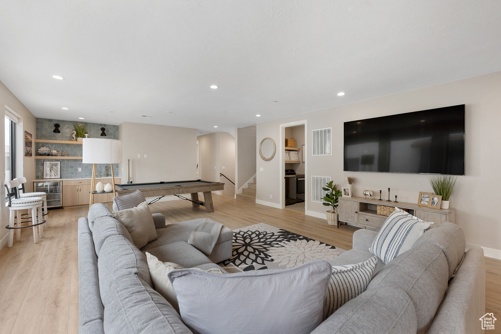 Living area featuring visible vents, pool table, beverage cooler, recessed lighting, and light wood-style floors