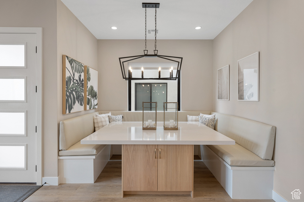 Dining space featuring breakfast area, visible vents, light wood-style flooring, and recessed lighting
