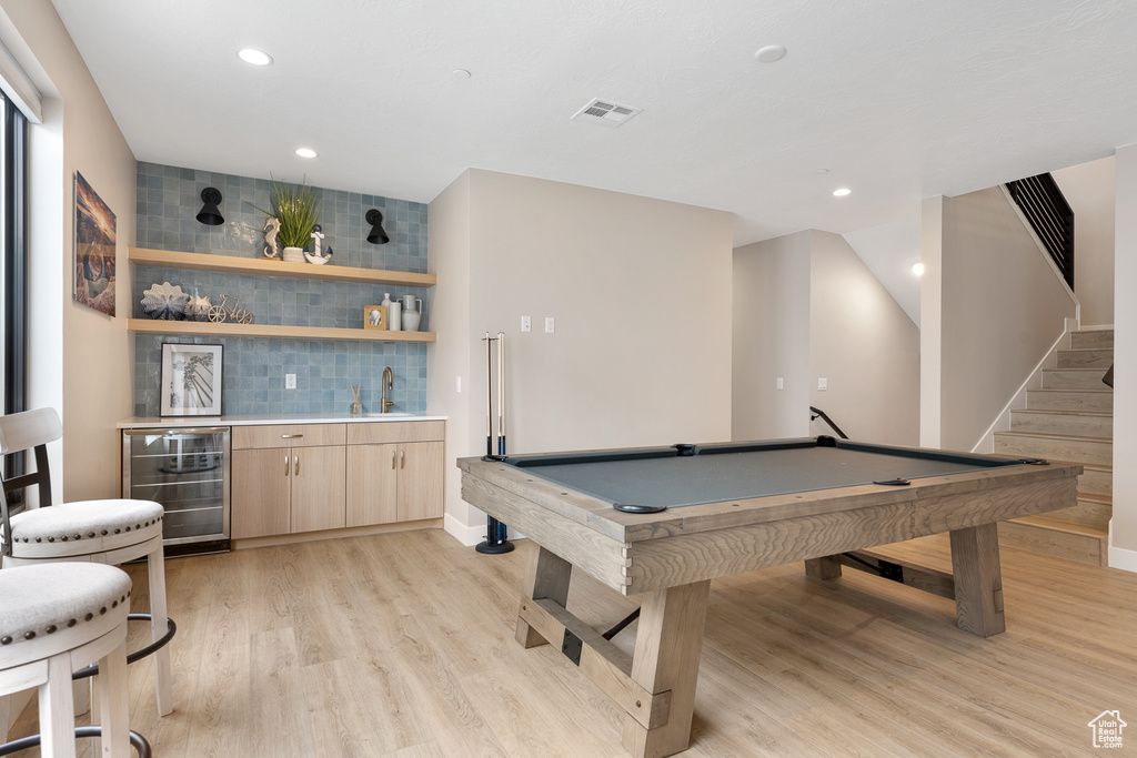 Recreation room with visible vents, wet bar, light wood-style flooring, pool table, and wine cooler