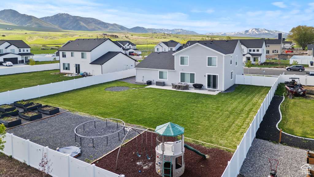 Aerial perspective of suburban area with mountains