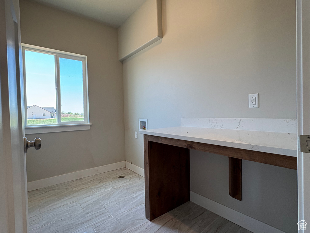 Bathroom featuring baseboards