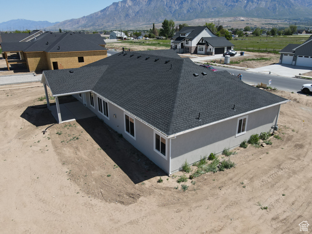 Aerial view of residential area with mountains