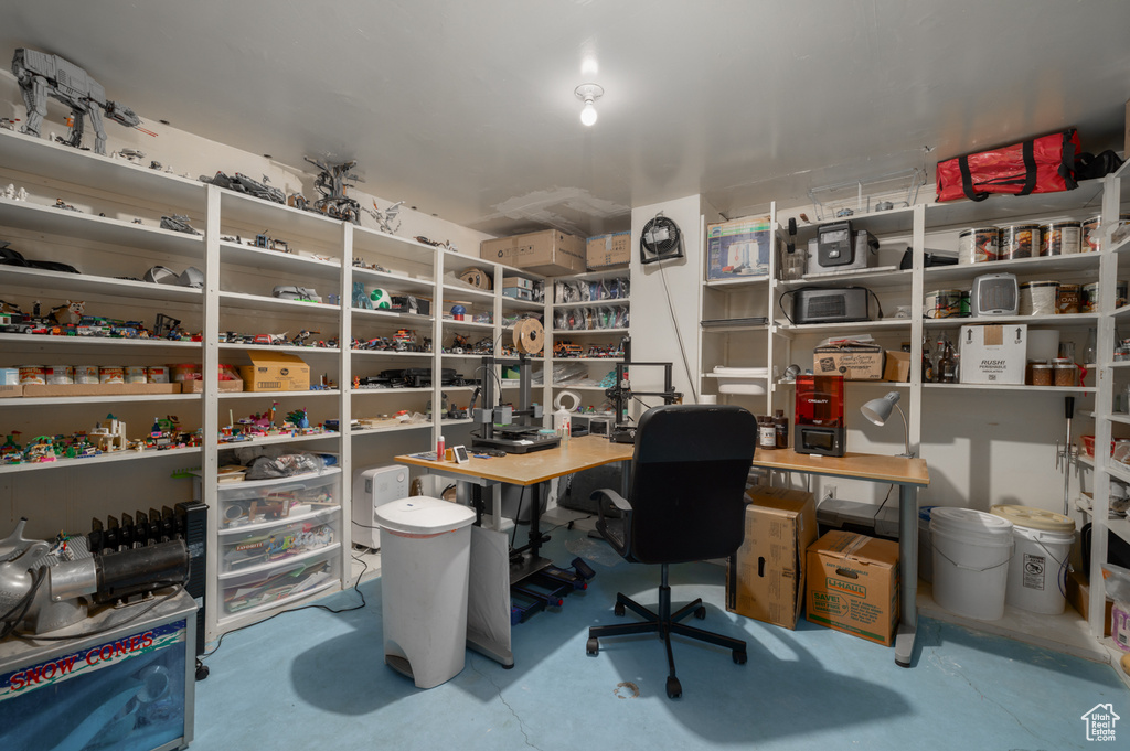 Office space featuring concrete flooring