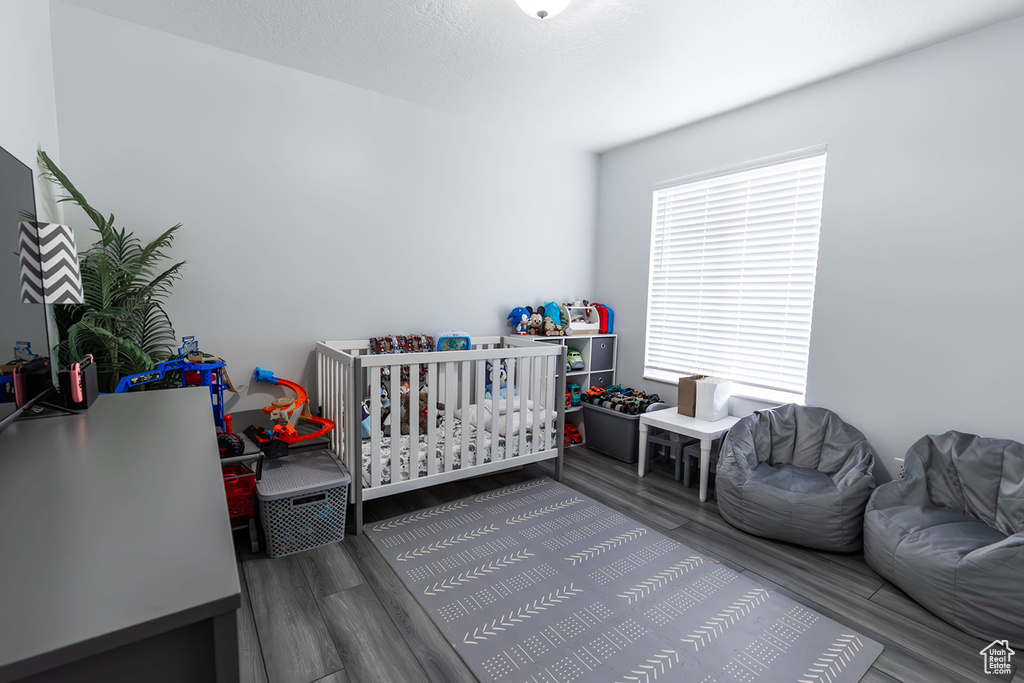 Bedroom with wood finished floors