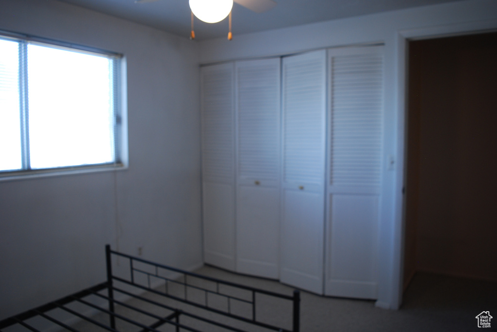 Unfurnished bedroom featuring a closet