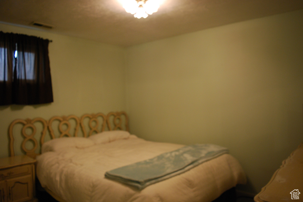 Bedroom with visible vents
