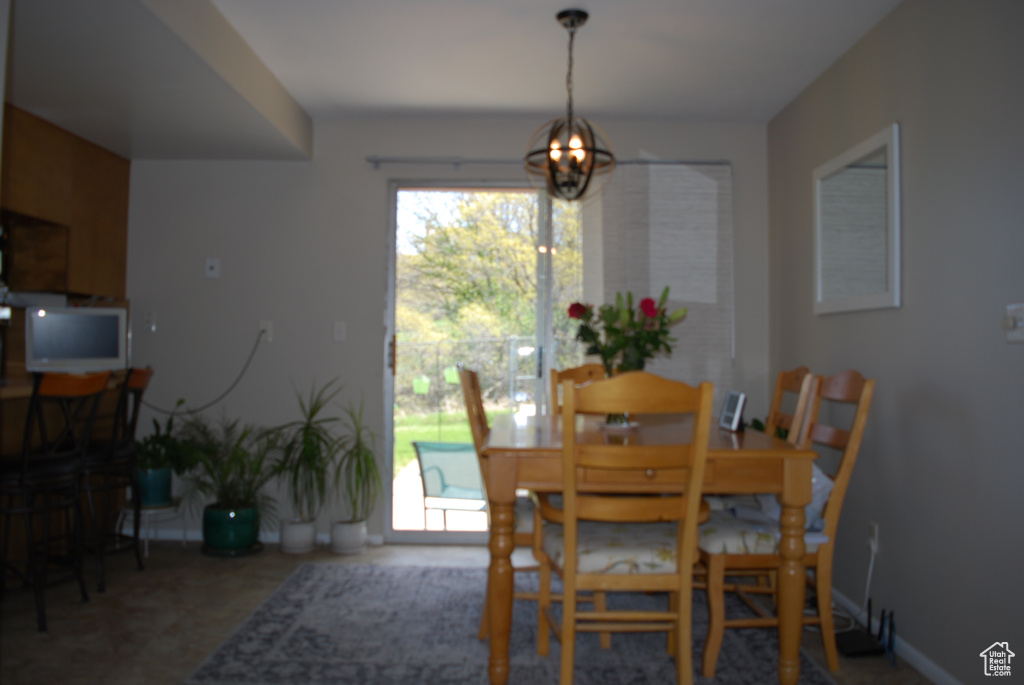 Dining space with a notable chandelier