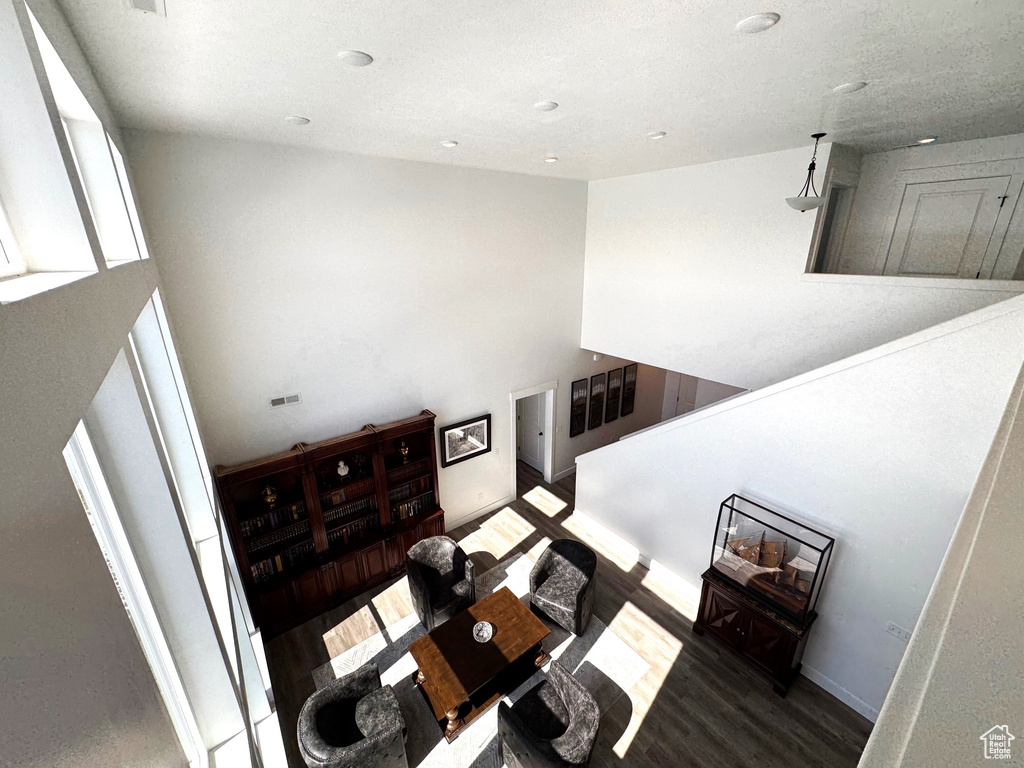 Living room featuring baseboards and wood finished floors