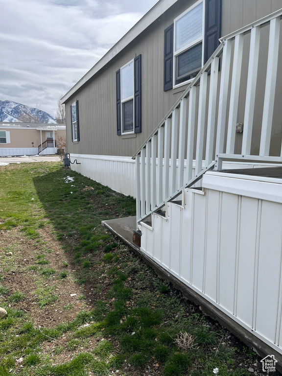 View of home\\\'s exterior with a lawn