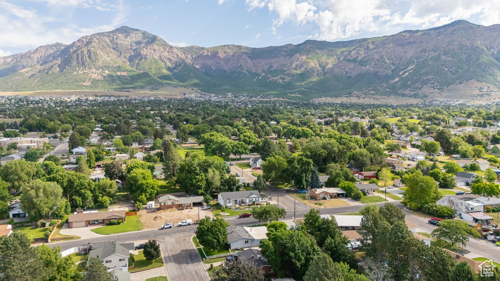 View of property location with a mountainous background and nearby suburban area