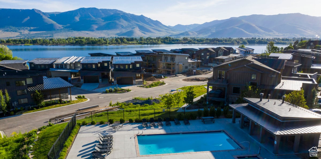 Aerial view of a mountainous background and a pool area