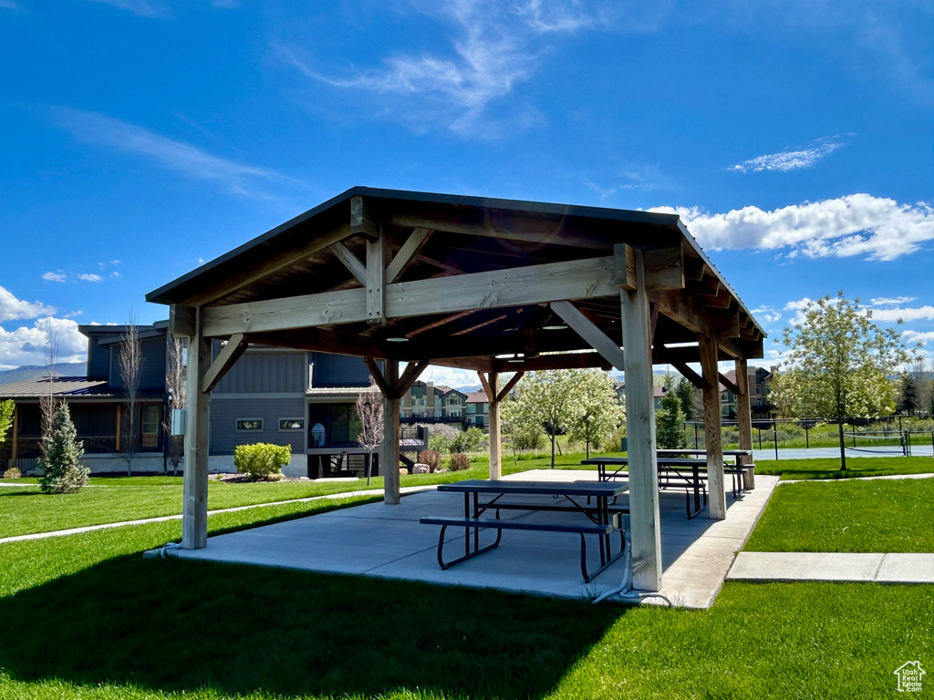 Surrounding community featuring a gazebo and a yard