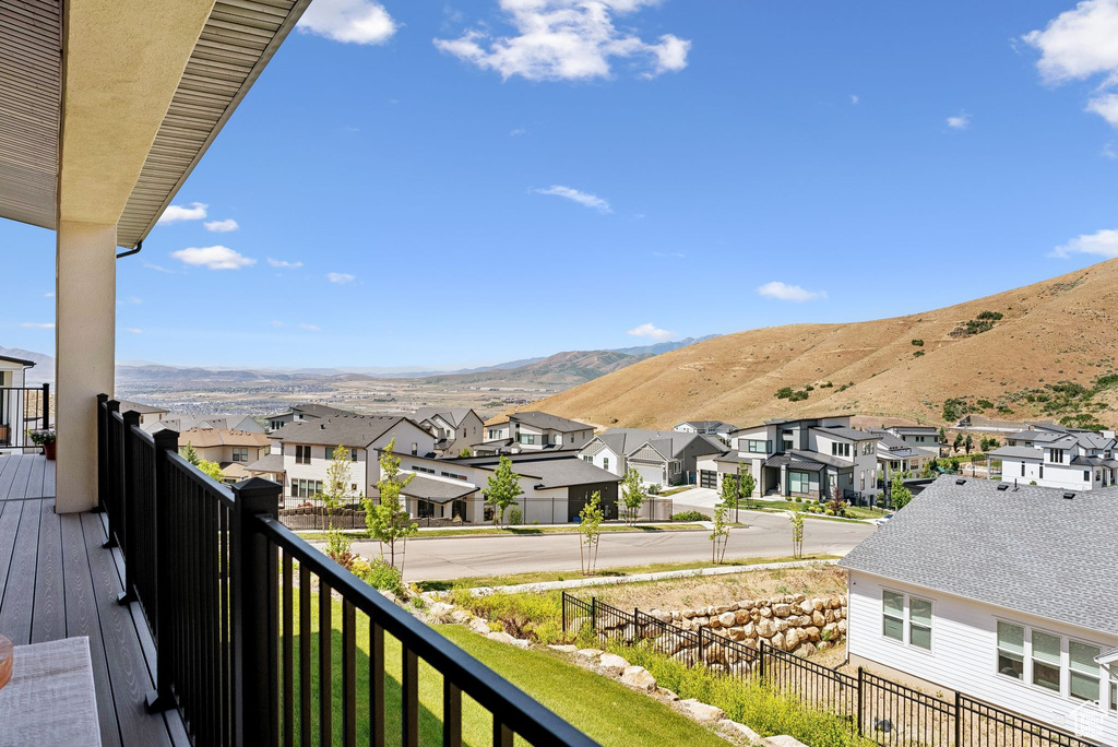 View of mountain backdrop featuring nearby suburban area