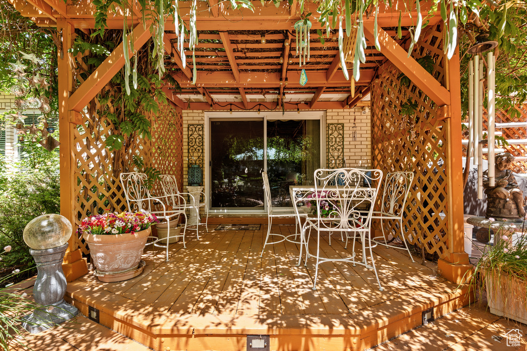 View of patio / terrace featuring a pergola and a wooden deck