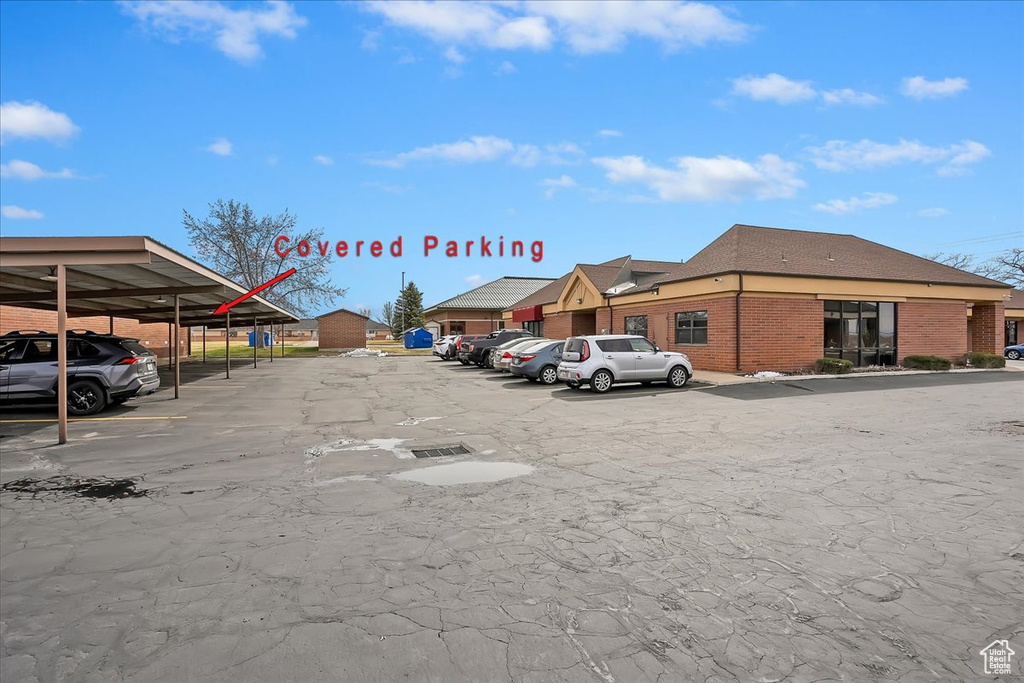 View of partially covered parking lot