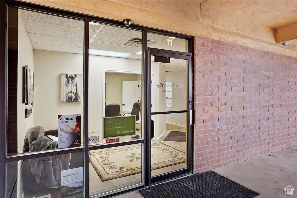 Doorway to property with visible vents