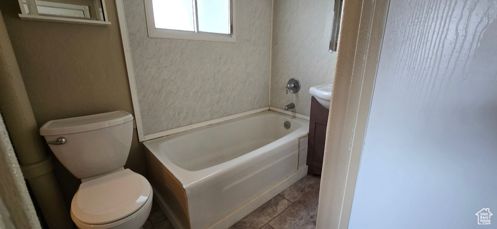 Full bath with toilet and a tub
