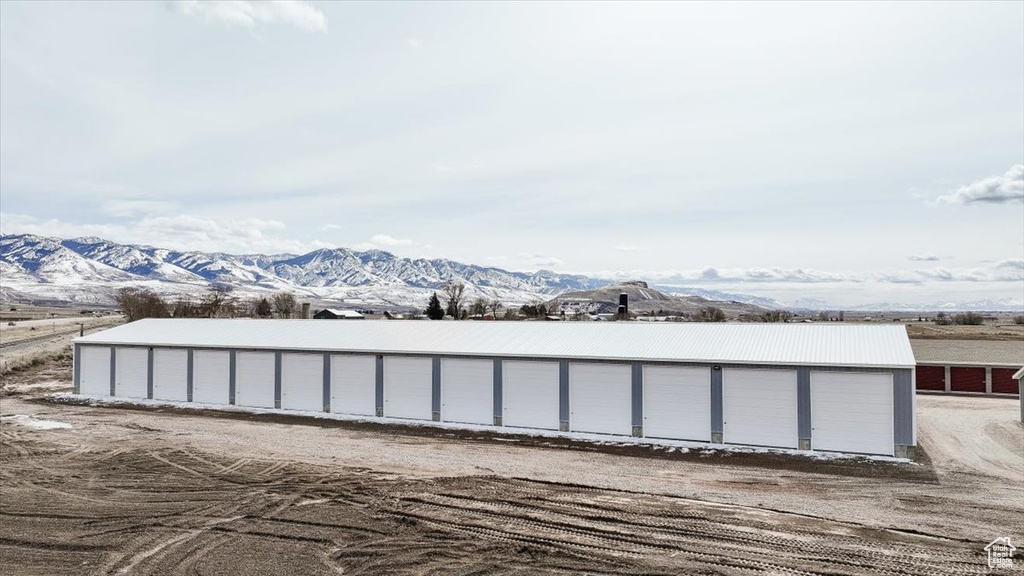Exterior space featuring community garages and a mountain view