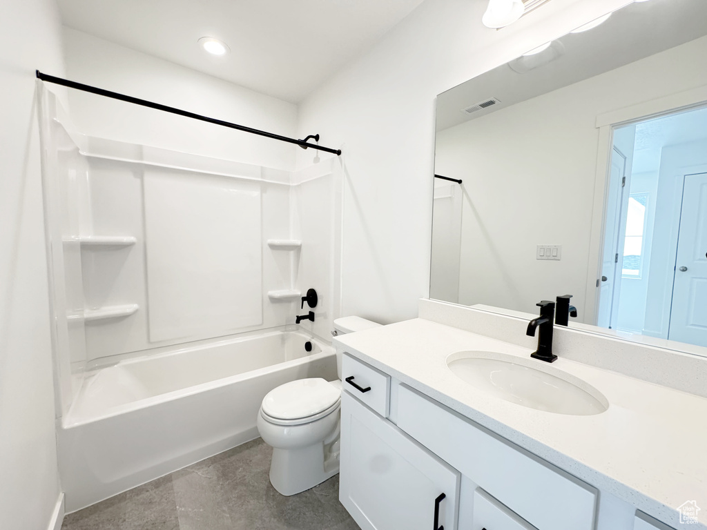 Bathroom with vanity, recessed lighting, toilet, bathing tub / shower combination, and visible vents