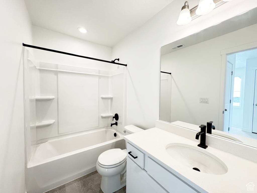 Full bathroom with toilet, vanity, recessed lighting, visible vents, and shower / bath combination