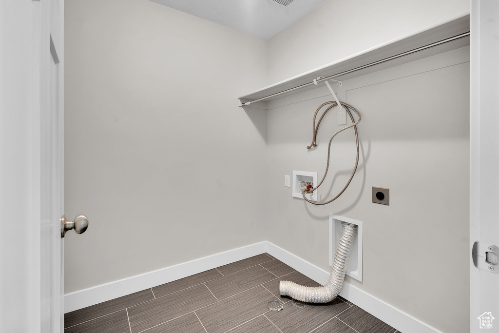 Laundry room featuring washer hookup and electric dryer hookup