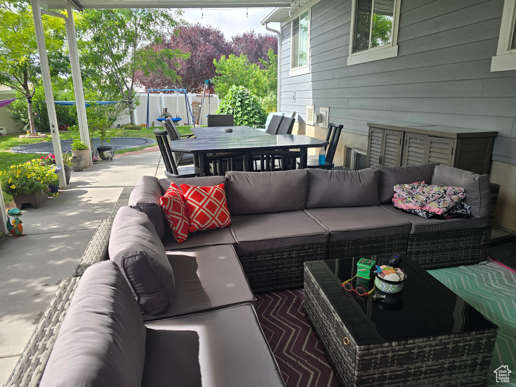 View of patio / terrace with an outdoor living space and outdoor dining space