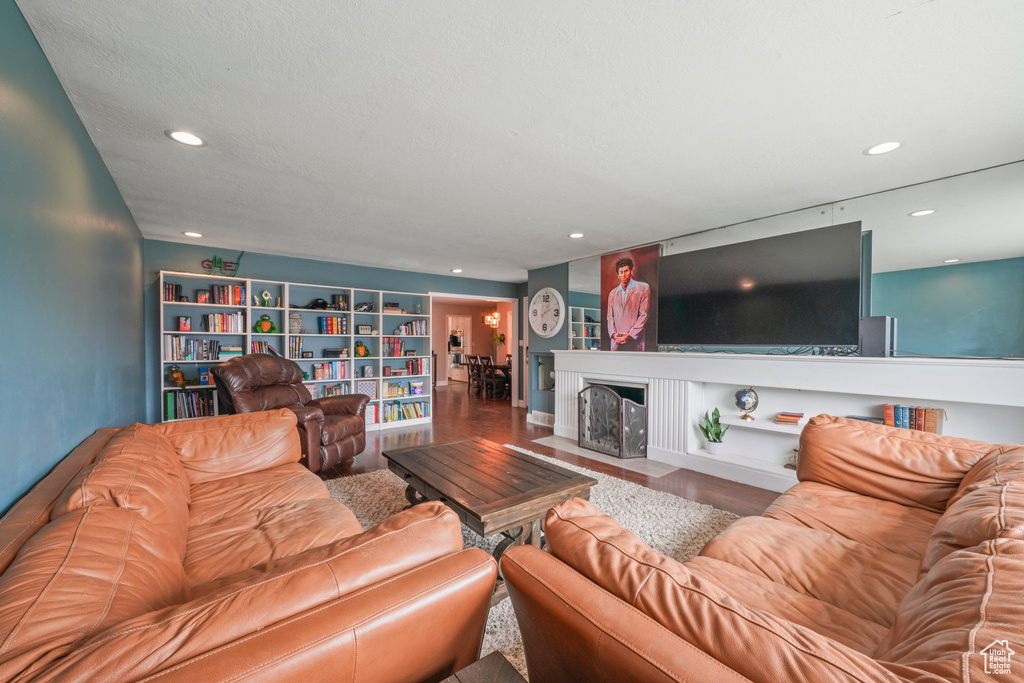 Living room featuring recessed lighting and wood finished floors