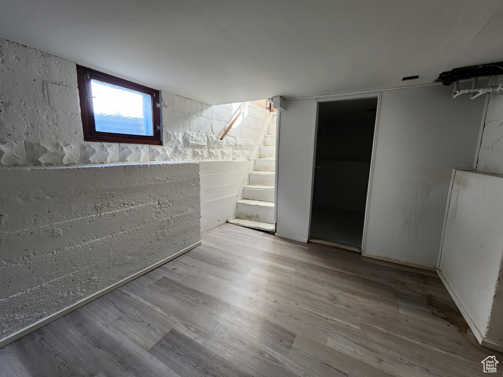 Unfurnished room with wood finished floors