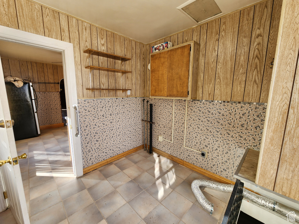 Bathroom with wood walls
