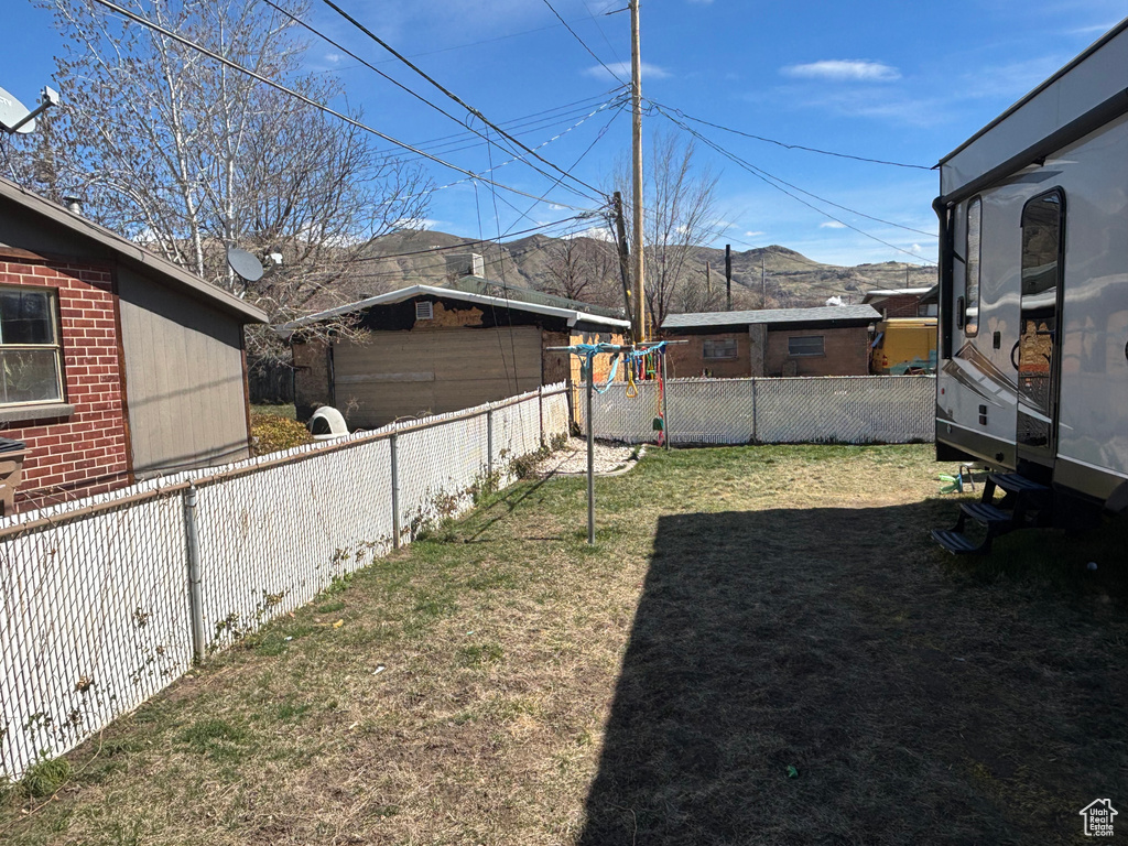 View of yard with a fenced backyard